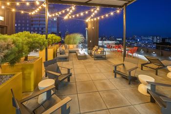 Rooftop lounge with fire pit & skyline views